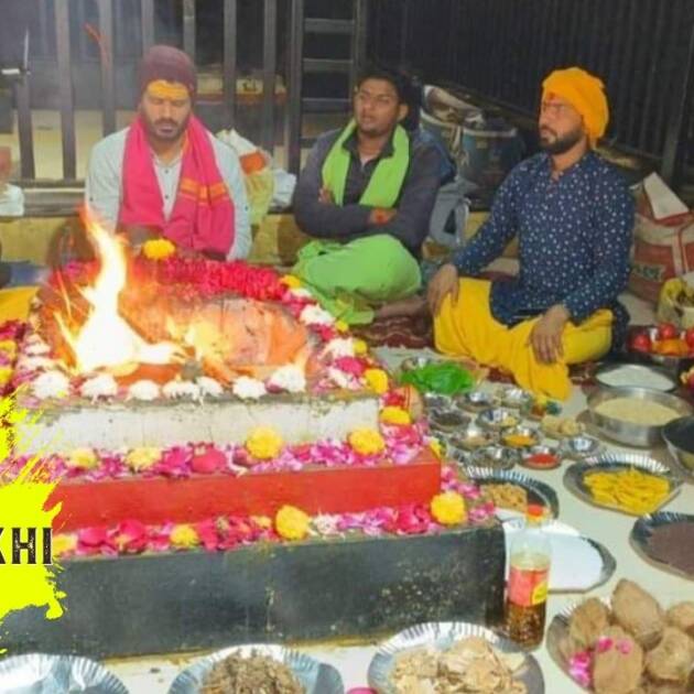 Image depicting a Baglamukhi Hawan ceremony, featuring participants seated around a sacred fire, offering prayers and performing rituals to honor the divine goddess Baglamukhi