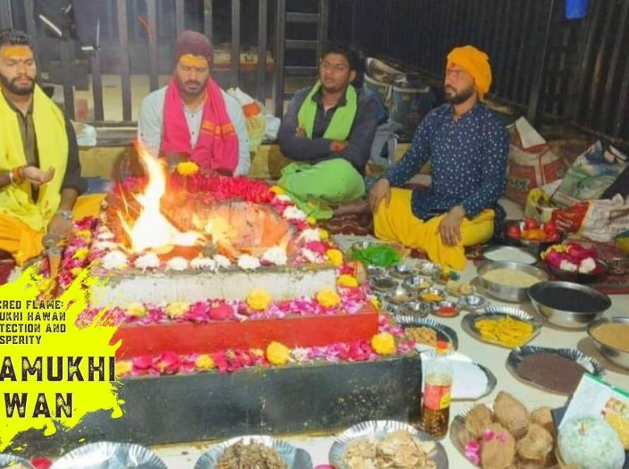 Image depicting a Baglamukhi Hawan ceremony, featuring participants seated around a sacred fire, offering prayers and performing rituals to honor the divine goddess Baglamukhi